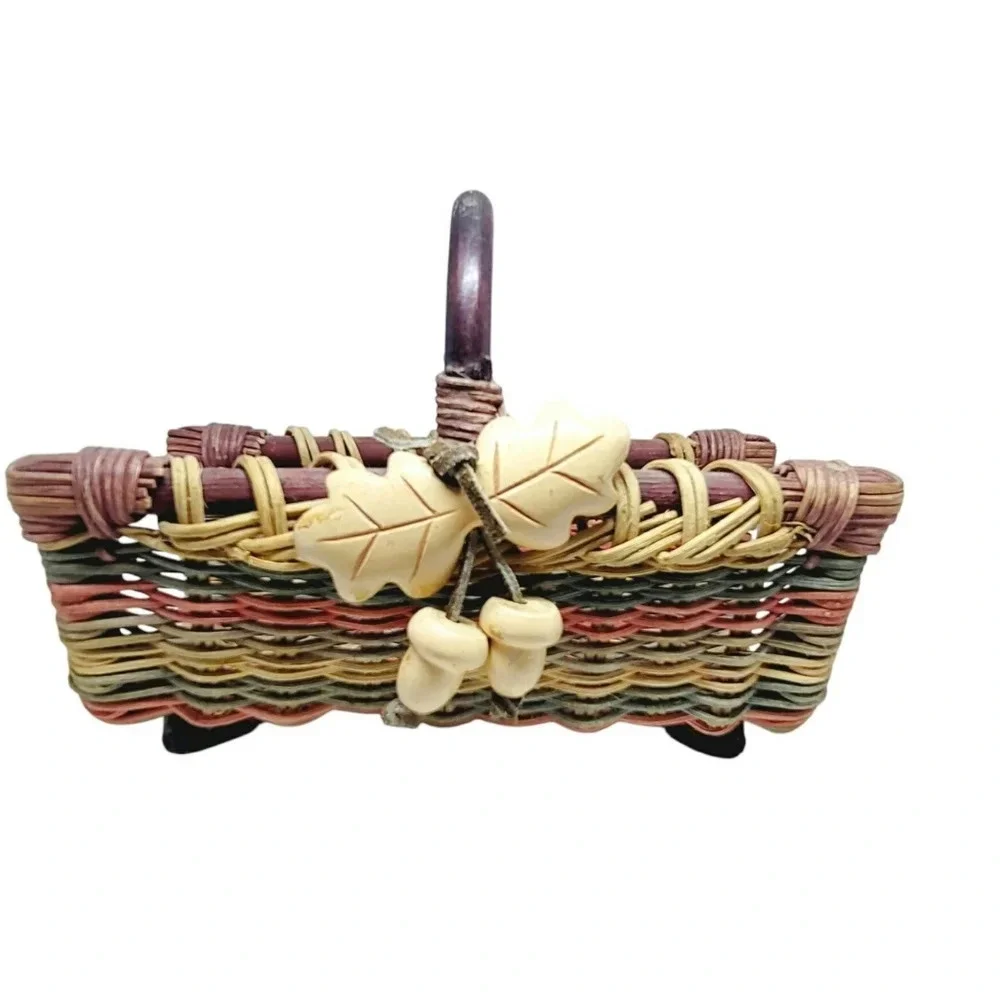 Colored Woven Basket with Wooden Leaves and Acorns Accents